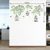 Wall sticker featuring a colorful birdcage hanging among garden flowers RPCFS6037T50