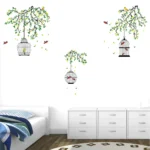 Wall sticker of a vibrant bird cage hanging in a garden RPCFS6037T50