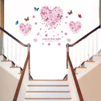 Wall sticker of three butterflies and a heart in soft pink tones RPCFS6011T50