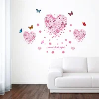 Wall sticker of three graceful butterflies with a heart in pink RPCFS6011T50