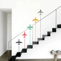 Wall sticker of vibrantly colored airplanes flying high RPC942